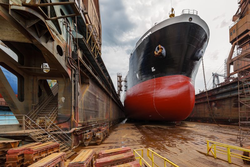 Ship's hull in dry dock under survey